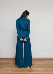The Tina jumpsuit, Vanessa Cocchiaro, blue, long sleeve, plunging neckline, wide leg, wedding guest, satin, black tie